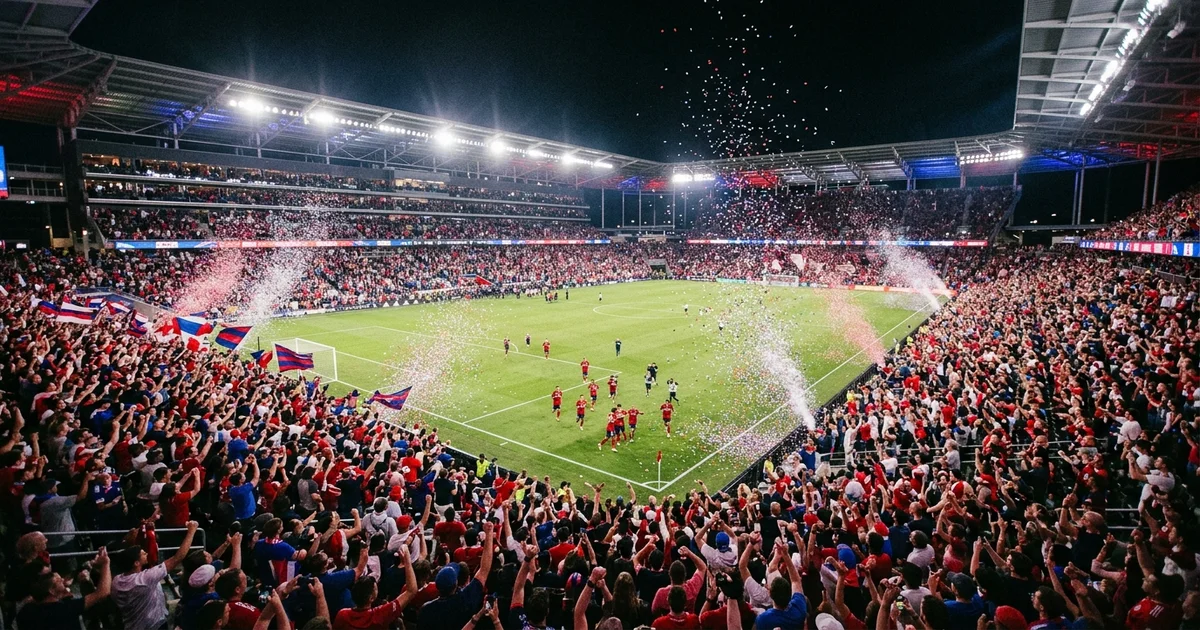 Packed American soccer stadium at night with confetti falling during World Cup celebration