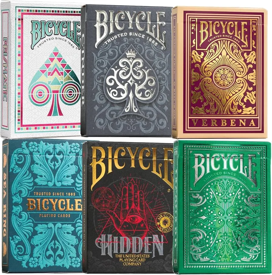 Six Bicycle playing card boxes showing different card back designs